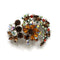 Gorgeous vintage brooch from the 1950s in assorted autumnal coloured rhinestones in rhodium plate Made in Austria