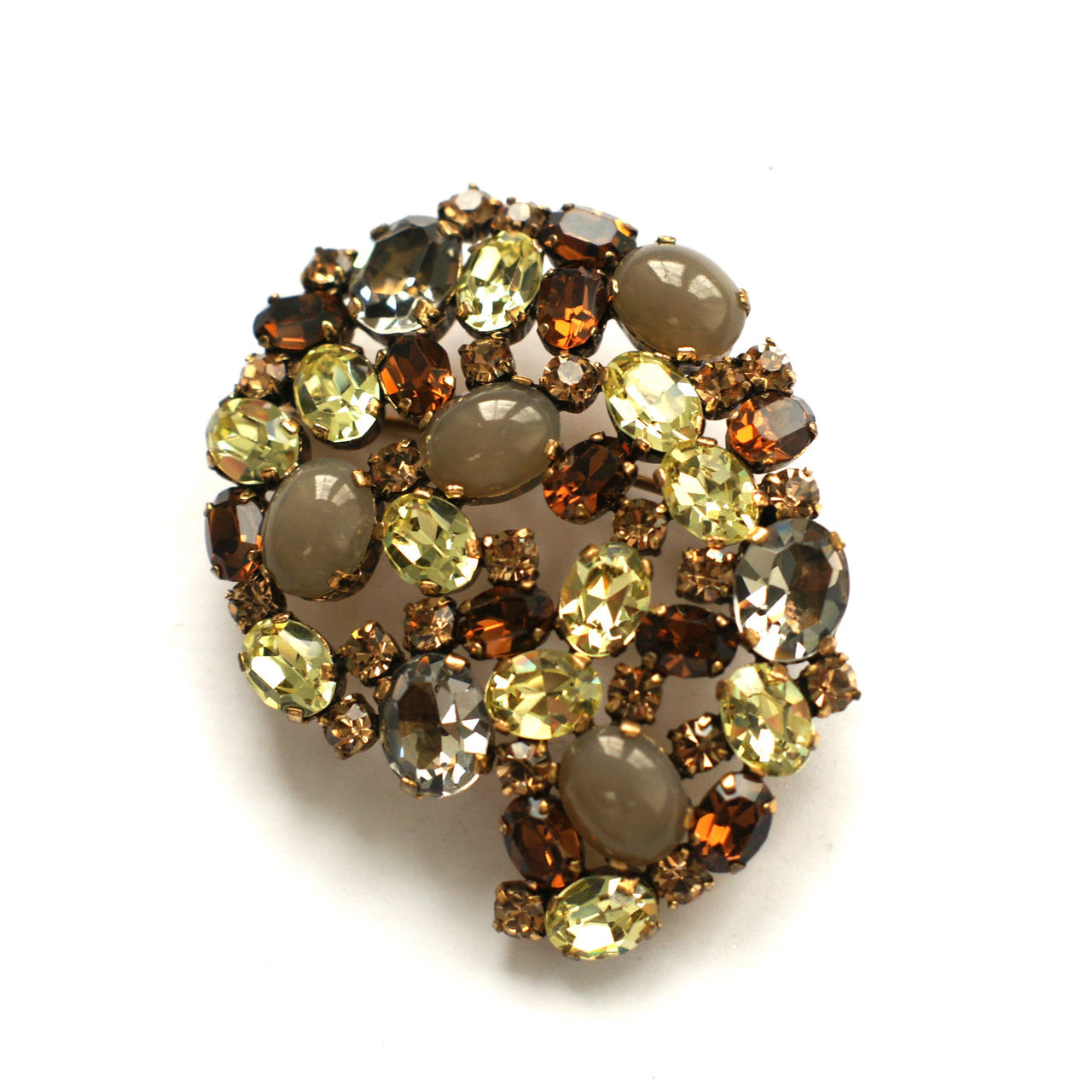 Vintage sparkly brown and grey brooch offset with yellow claw set rhinestones creating a textures soft effect in bronze plated metal.