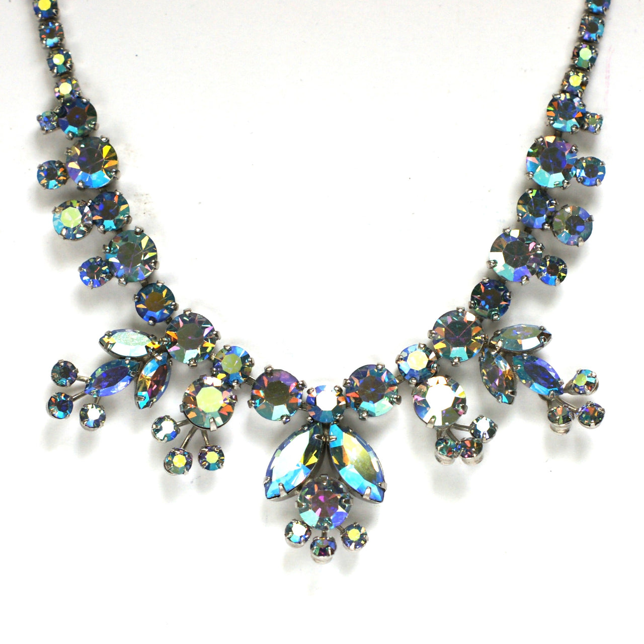 iridescent blue rhinestone necklace in white metal by Sherman from the 1950s 