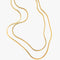 Great for every day this gold plated piece is a stylish flat snake chain featuring two different length chains in one necklace.&nbsp; Fastens with a strong lobster clasp.